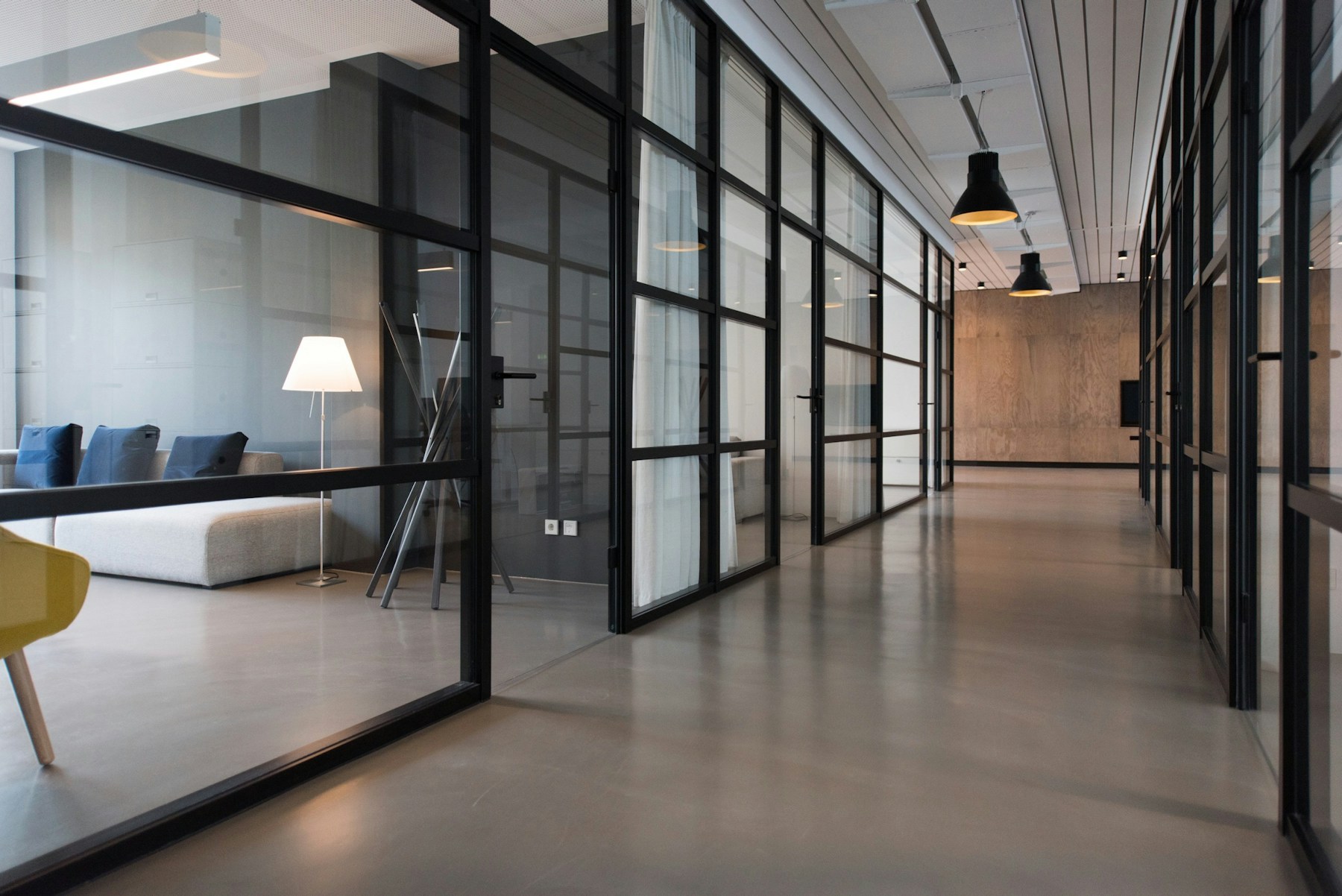 Modern consulting workspace with team strategy session